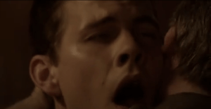 Pictured: Charlie dying. Not an intimate embrace between male lovers.