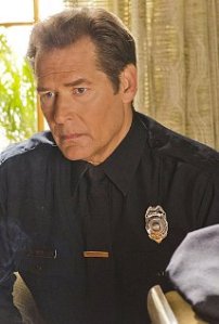 He had something in his hand. He'd stolen it from the crime scene. A trophy.