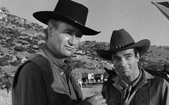 Charles K. Feldman Group. One of these guys looks like he's been in a couple fights before.